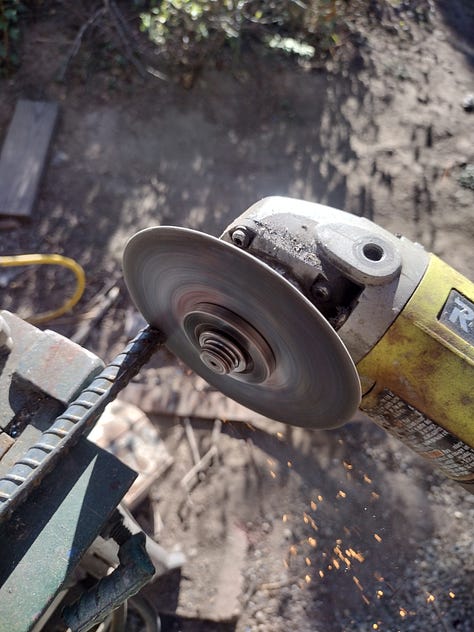 Cutting, stacking, and heating four lengths of rebar.