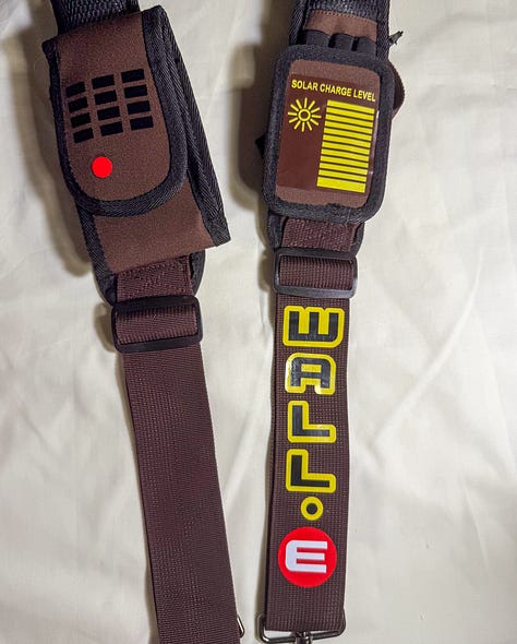 Brown tool harness with vinyl decals