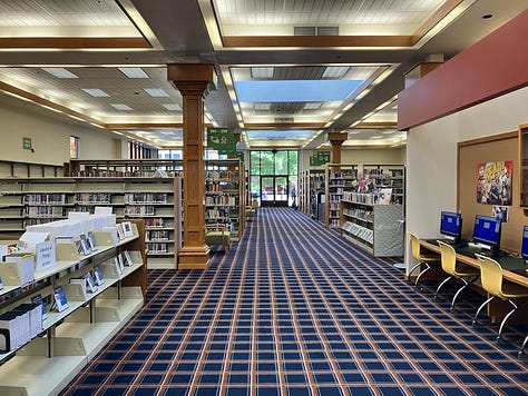 Library photos showing books, computers, and the author