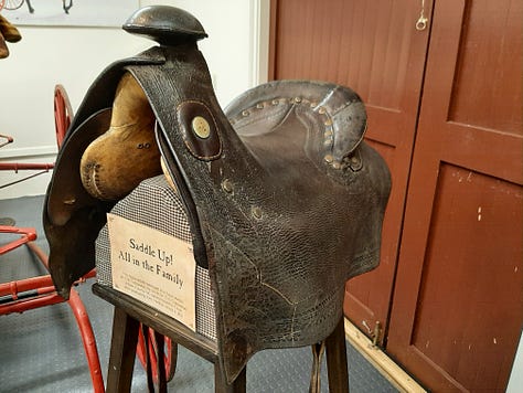 A saddle, a buggy and a car, all of which were used by country doctors in North Carolina.