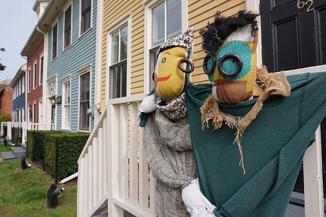 Scarecrows wear old clothing, colourful accessories, and funny expressions on their faces as they stand propped up against lampposts and other landmarks in Charlottetown.