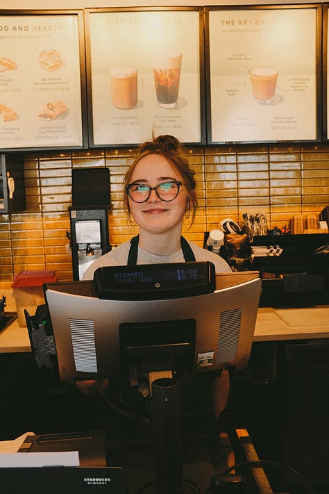 starbucks barista, mirror reflections, man protesting, by Tyler Knott Gregson
