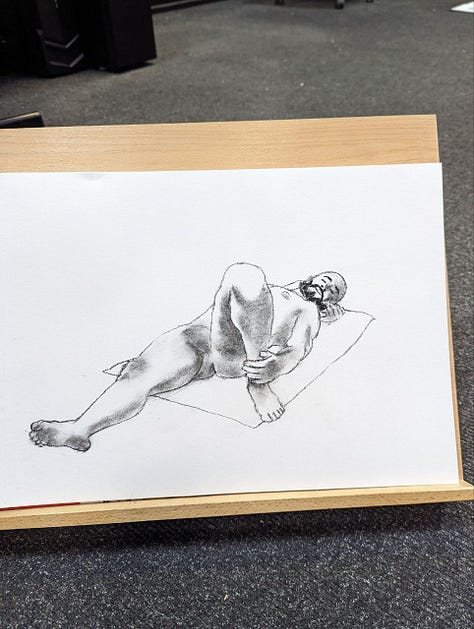 Male life model poses for life drawings