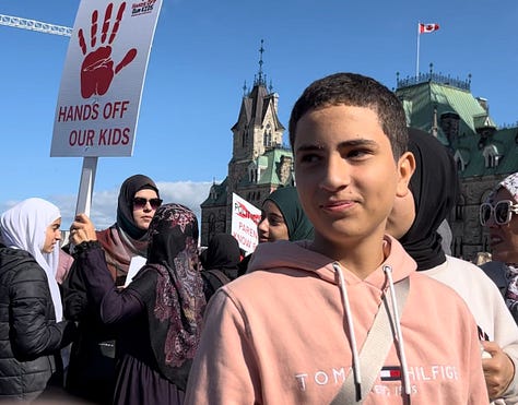 Parents and grandparents with children protested against gender ideology being forced on them in Canadian Schools. The parents and children took Parliament Hill as counter-protestors were held back on the other side of Wellington Street.