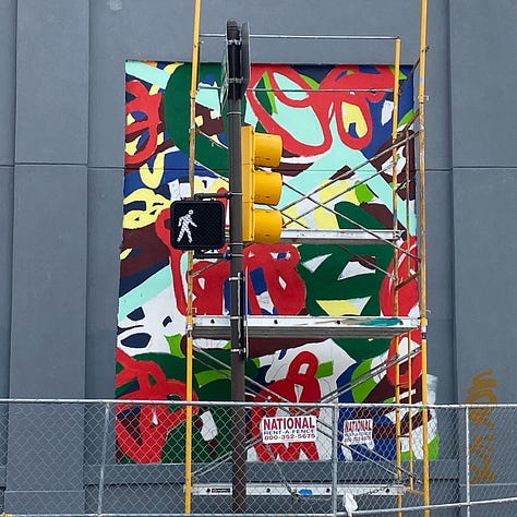 Series of nine photos depicting the evolution of my mural "Bound Together" located at 10th and Callowhill Streets in Philadelphia's Chinatown area. 