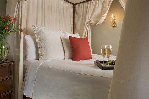 breakfast room, view of street scene, en suite room, fireplace, cozy bed