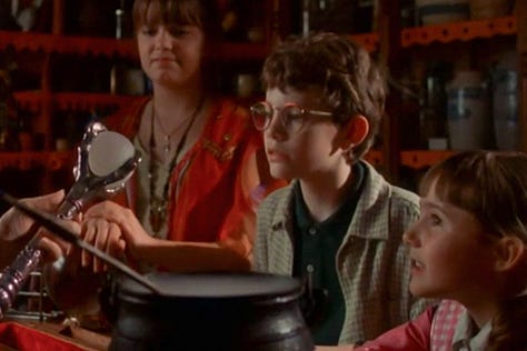 Shots from Halloweentown (1998), including the famous "Bubble, Toil, Trouble" settings on a microwave, and the kids gathered around the witch's brew cauldron and talisman