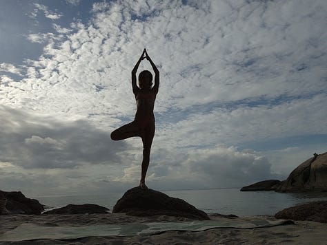 Morning beach yoga on Koh Phangan