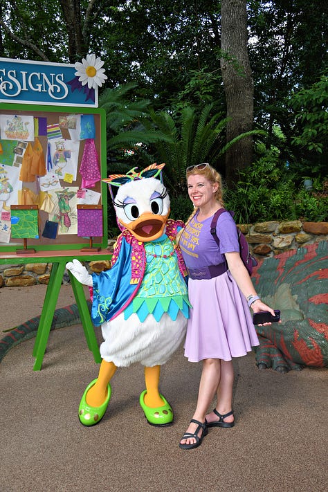 Pictures of Cass at Animal Kingdom on three different days, as evidenced by three different outfits