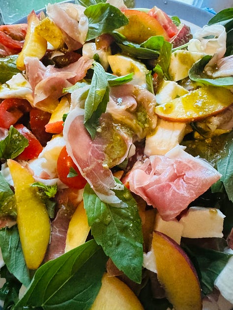 Peaches in yoghurt with mint, yoghurt mint, pomegranates, prosciutto necatarine salad, broccoli salad, tomato salad with burrata, heirloom tomatoes 