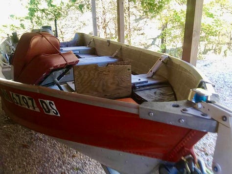 A peeling, sun-damaged, debris-filled red boat transforms into a sleek, black craft for Daddy-Daughter bonding