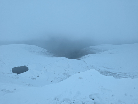 Sunset walk on Pen y Fan in winter with snow 