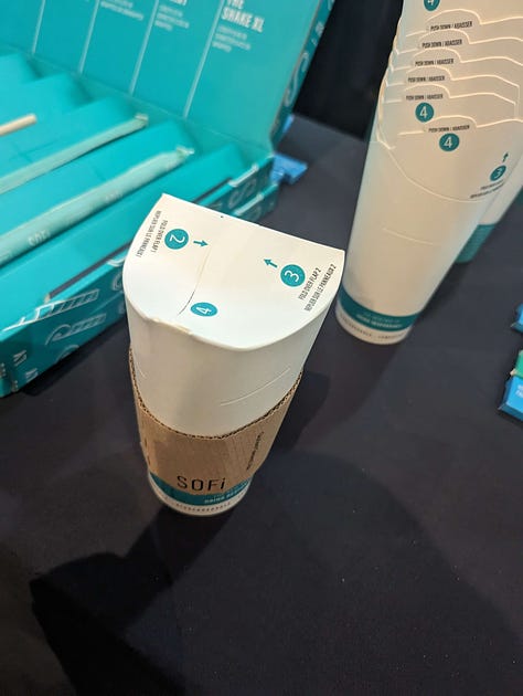 SOFi company's booth pictures, straws and cups