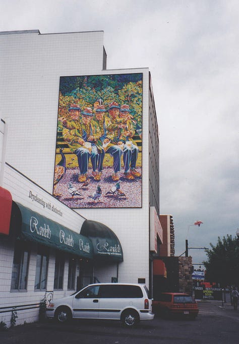 Pictures of murals on some walls in Calgary.