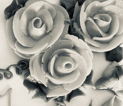 Image one: a vintage foosball table; Image two: black-and-white frosting roses on a cake; Image Three: sunset and palm trees wallpaper that's peeling off the wall.