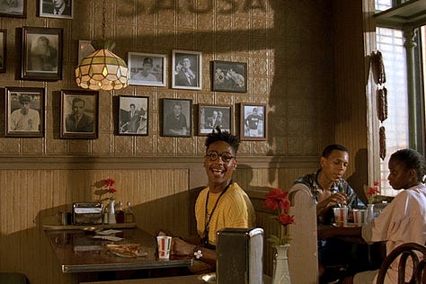 Spike Lee and Giancarlo Esposito at Sal's Pizzeria ordering and delivering pizza in Do The Right Thing (1989)  | Film Flavor: A Newsletter Surveying Food in Film