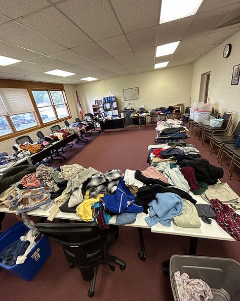 Some pictures from the clothing swap. Lots of clothing, and you knew I just had to promote the newsletter ;)