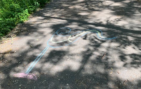 Chalked exhortations, Swedish flag and pig