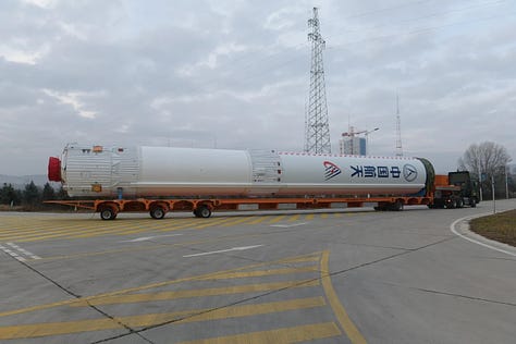 Hardware for the Long March 6A Y22 vehicle being stacked ahead of launch and heading to the launchpad.