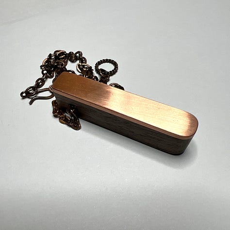 Pictures of wooden and metal pendants