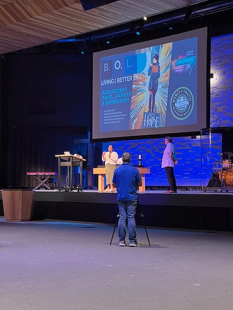 an image of a stage, two images of the ADHDKC table with promotional items and a woman talking to two different groups of people