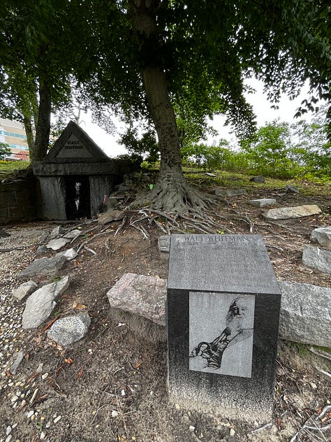 Images of Walt Whitman's final resting place: tomb, trees, plaque.