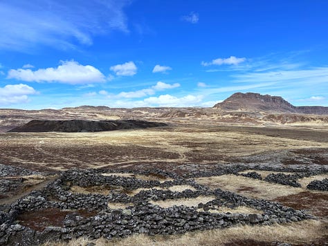 Myself and my son looking sleepy at Grábrók and the views climbing up the crater and across the lava fields.