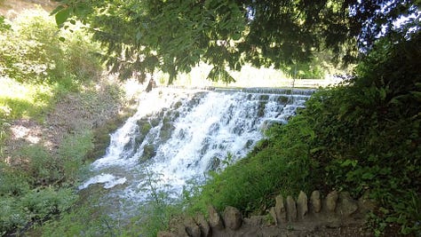 5 photos. Sherborne Castle and Gardens. The cascade waterfall, views of the lake and flowers. Images; Roland's Travels