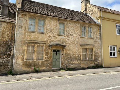 Two old cottages, numbers 75 and 77 High Street, Corsham, Wiltshire. Number 75 has the remains of the sign for the Temperance Hotel above a ground floor window. Images: Roland's Travels