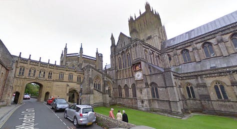 Passing the Cathedral Green in Wells into the portico onto St Andrew Street. You can see the famous Wells Clock to the right in the second photo. (More on that later this week!)  