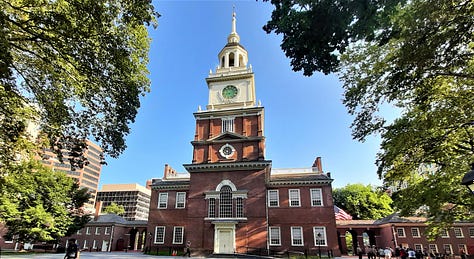 The first picture is of a statue of a soldier on a horse in the foreground and the Pennsylvania monument in the background; the second picture is the stone house that George Washington used as a headquarters during his stay at Valley Forge; and the third photo is the tall brick building known as Independence Hall in Phildelphia.