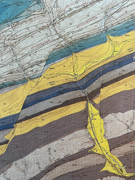 Five close-up pictures of topographic maps