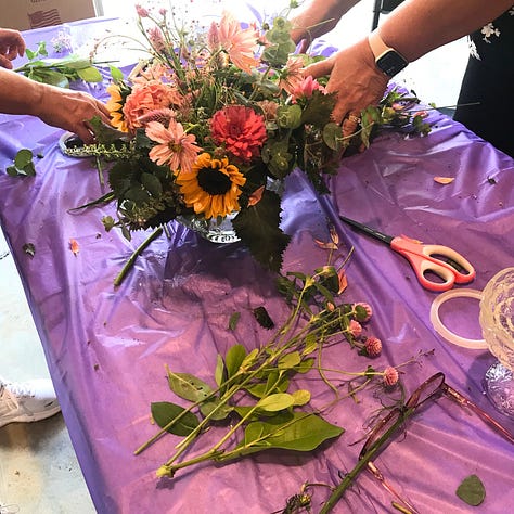 Images portray floral arrangements featuring dahlias, sunflowers, zinnias, and other blooms and foliage capturing the autumn season.