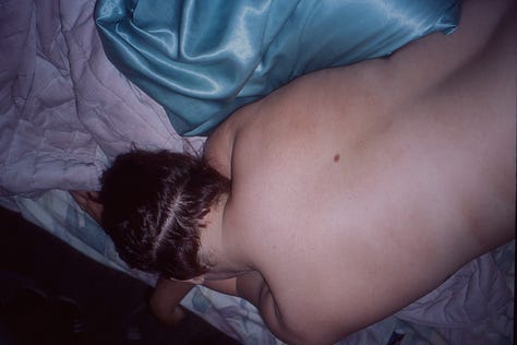 top row, left to right: nat lies face down in bed without a shirt on; their overgrown undercut is visible. a white liquid dissipates in green water under a dock. a bouquet of dried hydrangeas hang on a closet door. bottom row: the sun rises over a bedroom in cape may, nj. on blue film stock, nat floats in the lake and eats a peach. a pink bmw convertible is parked outside ike’s auto shop.