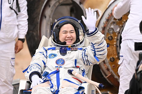 Wang Haoze (left), Song Lingdong (center), and Cai Xuzhe (right) after exiting the Shenzhou-19 spacecraft in the Inner Mongolia region.