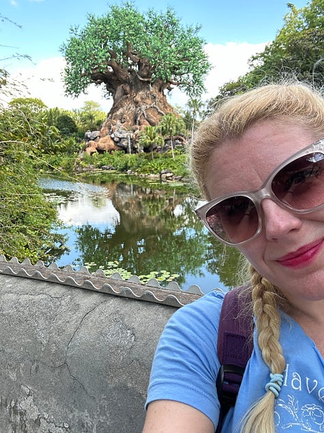 Pictures of Cass at Animal Kingdom on three different days, as evidenced by three different outfits