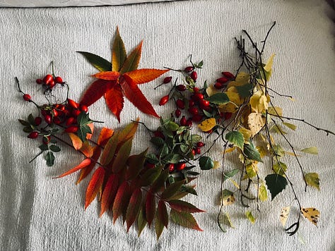 Autumn leaves, crafts on table with colourful leaves