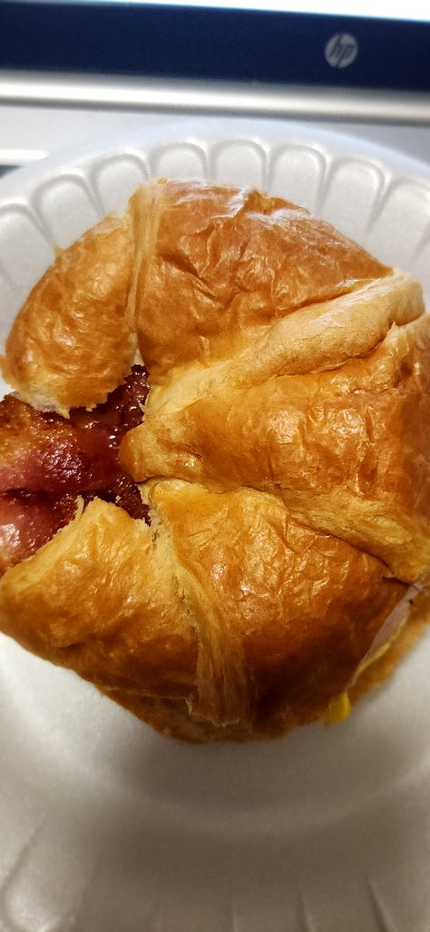 three pictures showing different angles of a homemade bacon, egg, and cheese breakfast sandwich on a croissant.