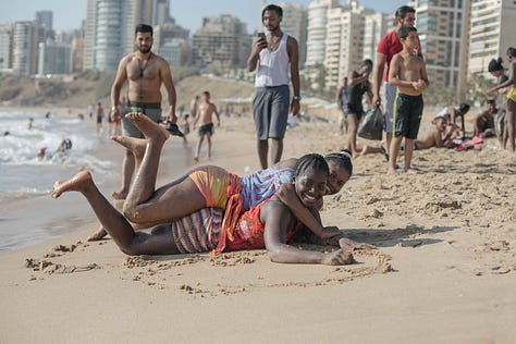 Aline Deschamps' photos of exploited African women enjoying a moment of freedom at the beach in Beirut.