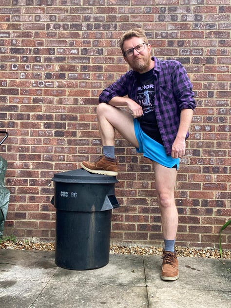 A poster advertising my visit to a school, a shelf of international versions of There's No Such Thing As A Silly Question, posing inelegantly on a bin