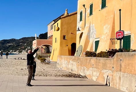 Top L-R: Coco joyously digging for clams, happy bare winter feet in the sand, beautiful Varigotti, beachbasketball court, my favorite place for pasta al pesto in Spotorno, sunset from our room, trofie al pesto, my smile says it all: nothing like Ligurian focaccia for breakfast, fresh local anchovies 2 ways