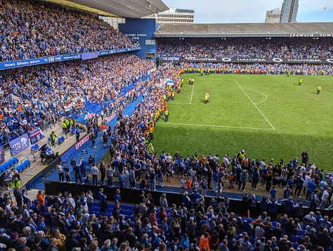 Five images of the pitch invasion after Ipswich win promotion