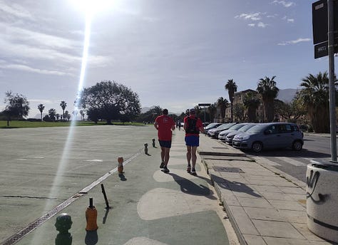 Pictures of the course show a broad concrete path for most of the path and blue skies