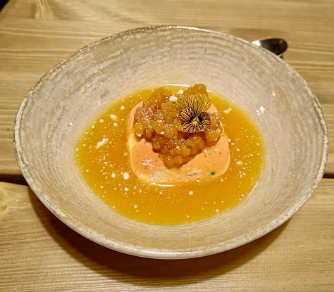 three images of plates of food, one of roasted reindeer, a dessert of cloudberries and a cured fish dish garnished with herbs