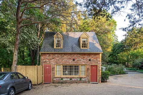a wedding venue, seating near a fireplace, a cottage, a veranda, a bedroom