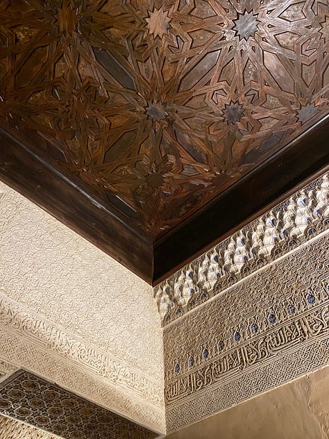 9 photos showing various views of interior parts of the Alhambra. Details of the Islamic calligraphic writing and various patterns carved into the walls.