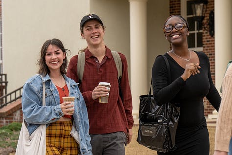 Students walk across the Troy campus heading to class