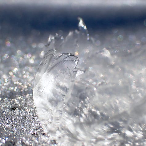 A series of three images shows a frozen bubble deflating and shattering.