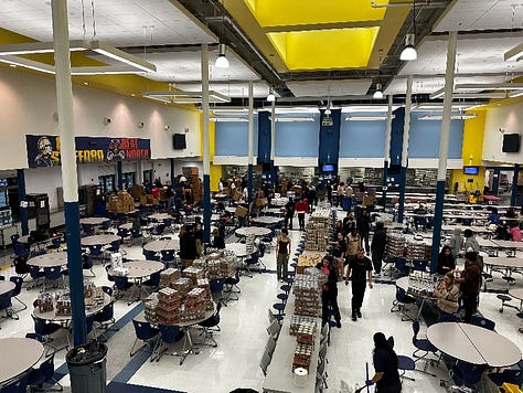 Stafford High School students pack and load meal kits for delivery to county schools. The service learning project was enabled by a $17,000 from Giant Food. Photos courtesy Stafford County Public Schools.