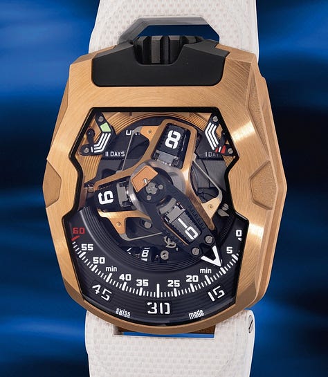 a Cartier Lantern Clock, A Breguet 3357 on bracelet, a Romain Gauthier HM, a De Bethune DB28GS JPS, a Krayon Anywhere, an H. Moser & Cie. Minute Repeater, an Urwerk WR-220 Miami Vibe, a BVLGARI Octo Finnissimo Minute Repeater, and an MB&F x H. Moser LM101 Red